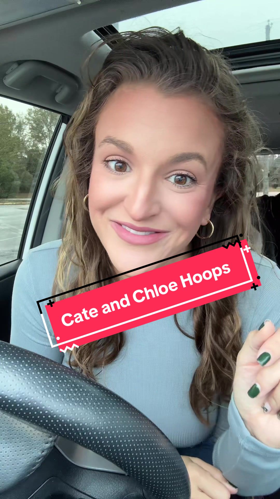 TikTok post by @mrshorton87 for Cate & Chloe. Caption reads: The @Cate & Chloe hoops are my favorite everyday....