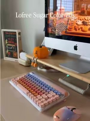 TikTok post by @nathalys_life for Lofree. Caption reads: [...] funnest keyboards in my collection 🧡....