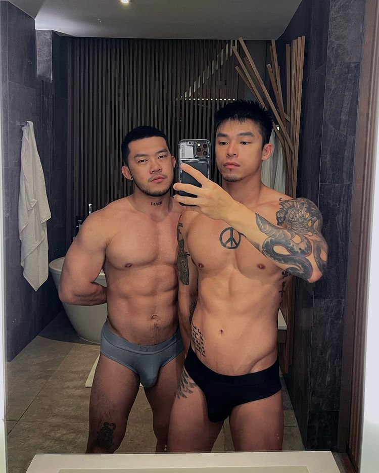 Instagram post by @xaviershih1115 for The Gay Passport. Caption reads: 木元素房間裡木質調的香薰充滿卻自在，夜晚枕頭上一朵清香的玉蘭花優雅而熟悉，一早落地窗映入公園的油綠遼....