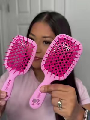 TikTok post by @jooccellyynn for Unbrush. Caption reads: [...] have matching barbie brushes 💖💕💞 #unbrush....