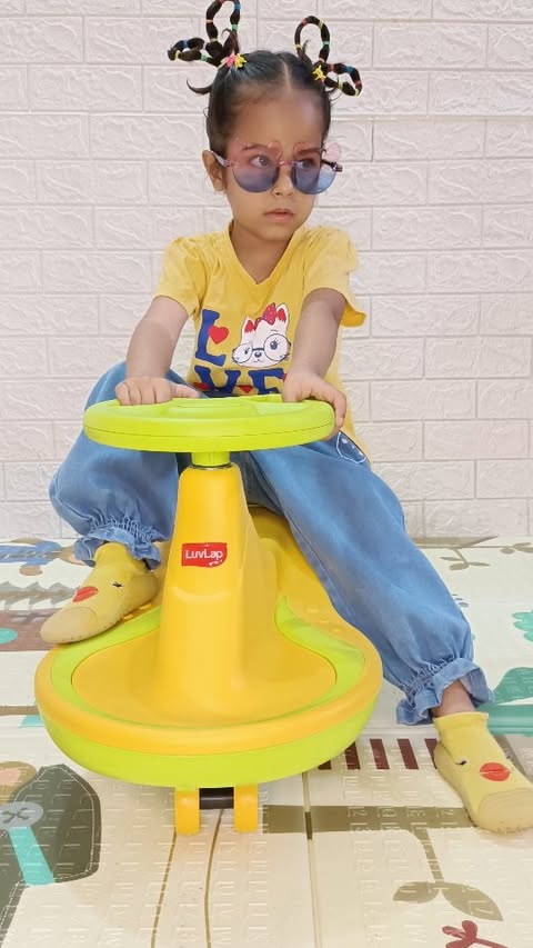 Instagram post by @aanshi_and_mumma for LuvLap. Caption reads: LuvLap Swing Car - Bachchon ki favorite ride!....