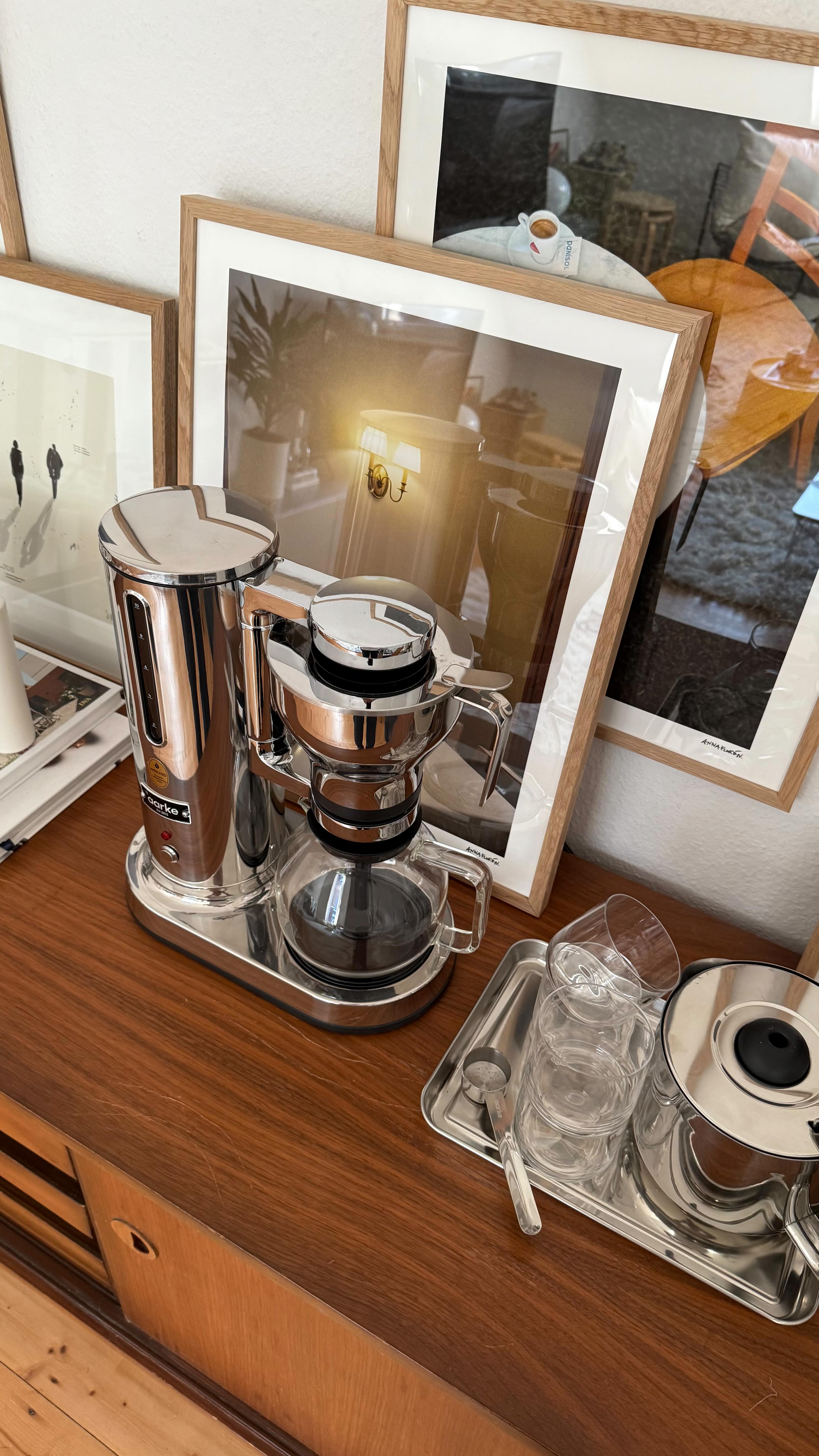 Instagram post by @zweiundsechzigqm for aarke. Caption reads: In paid partnership with @aarke 
For me, coffee is....