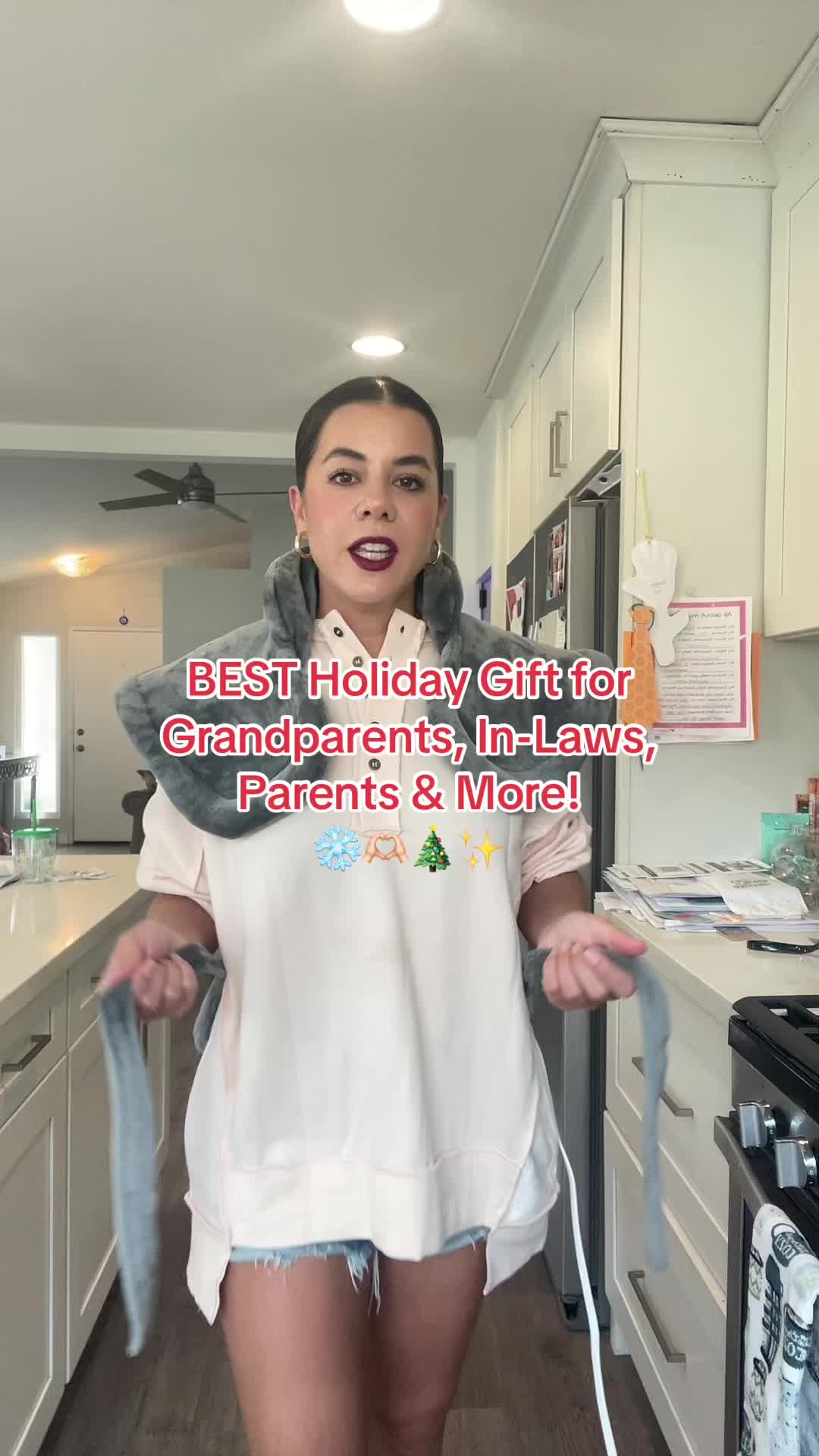 TikTok post by @ambernicolefashion for RENPHO. Caption reads: [...] this back heating pad from @RENPHO It’s....