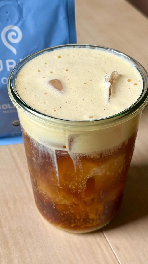 Instagram post by @glowwithella for Purity Coffee. Caption reads: [...] cold brew coffee!!!! ITS SO GOOD.....