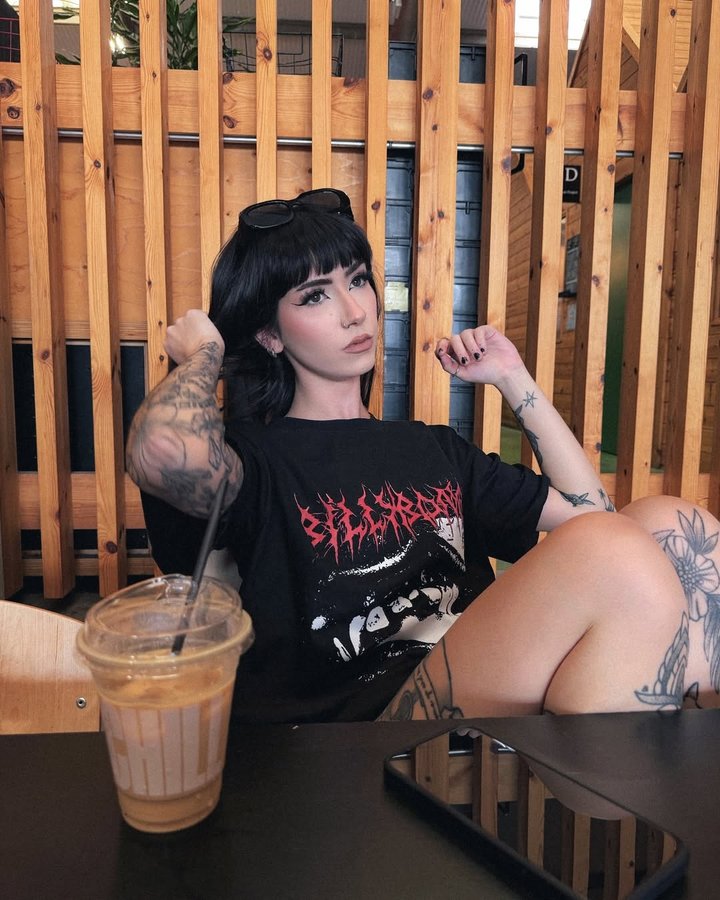Instagram post by @ellarosesharp for BILLY BONES CLUB. Caption reads: ☕️🖤✨ 

tee @billybonesclub *gifted.