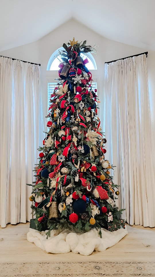 Instagram post by @ancar.abode for King of Christmas. Caption reads: •Wired ribbons, prelit tree and white fur skirt....