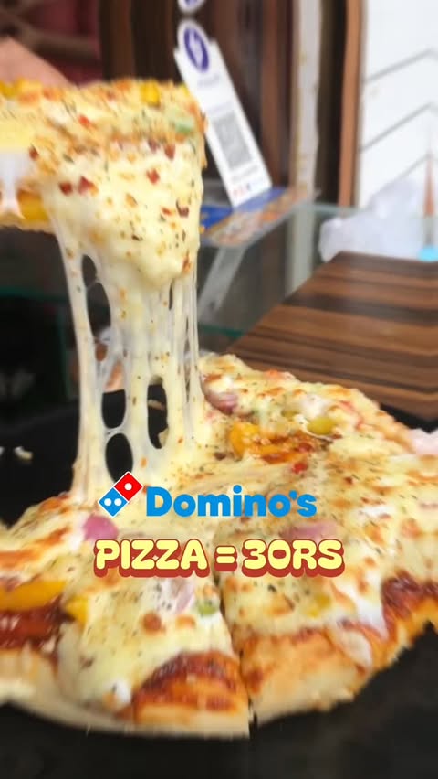 Instagram post by @baby_ayansh.roy for Domino's Pizza. Caption reads: #ad 🍕🔥Domino's DEALS are here! offers dropping....