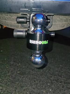TikTok post by @sandratrujillo22 for RHINO USA. Caption reads: Rhino USA Adjustable Trailer Hitch 2Inch Aluminum....