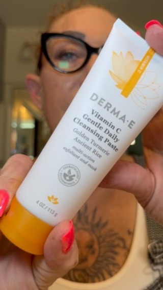 Instagram post by @just_janci for DERMA•E. Caption reads: @dermae 🍊 Next up, we have the DermaE vitamin C....