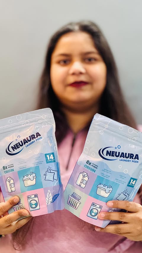 Instagram post by @lilstar_lavish15_ for Neuaura. Caption reads: Laundry made easy! 🧺✨ Just drop one Neuaura....