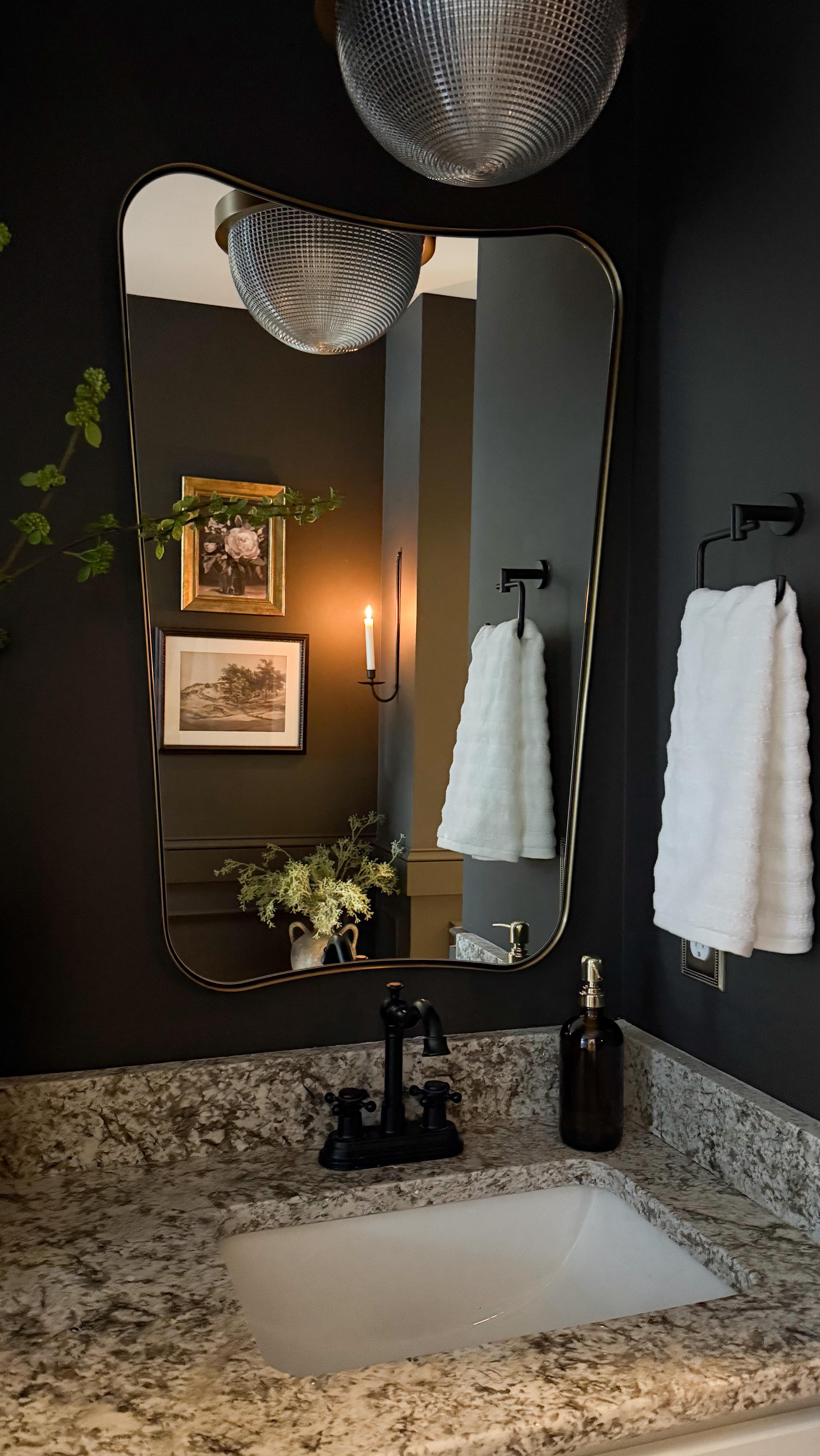 Instagram post by @oliveandoakhome for Benjamin Moore. Caption reads: AD This bathroom looks like it’s straight out of a....