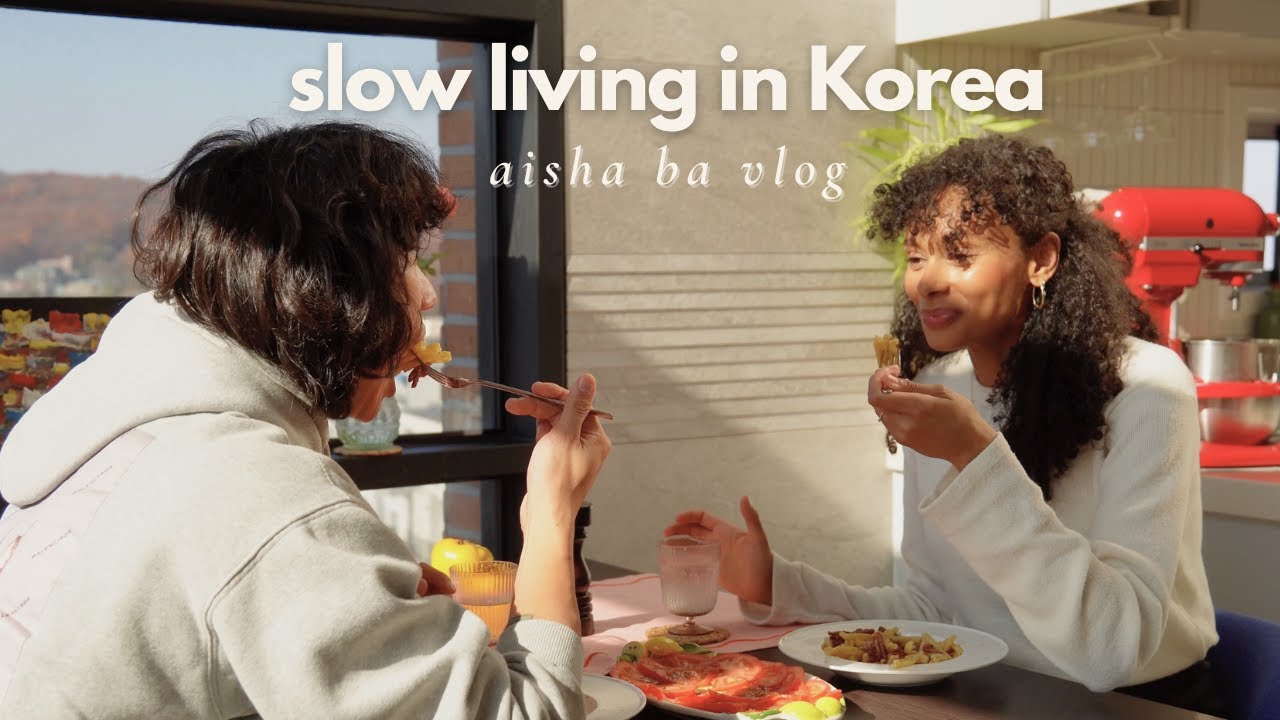 YouTube post by @AishaBa for Wishtrend. Caption reads: Slow Living in Korea | Cozy Autumn Week, Christmas....