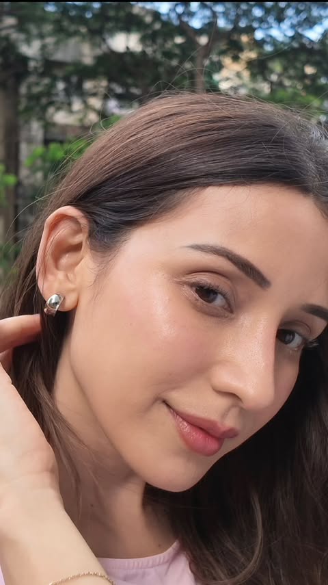 Instagram post by @heli_daruwala for Lovechild. Caption reads: [...] your best? ✨ The 4-in-1 Serum Tint by....