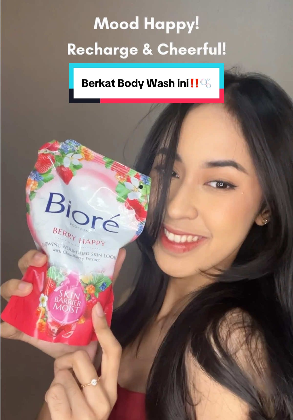 TikTok post by @nhdazhr for Bioré. Caption reads: Siapa sangka kulit lembap bisa bikin mood se-happy....