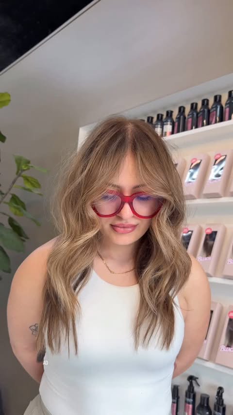Instagram post by @therealmarcmendez for SalonCentric. Caption reads: [...] the summer 🌻 #SCxMoroccanOilMay26....
