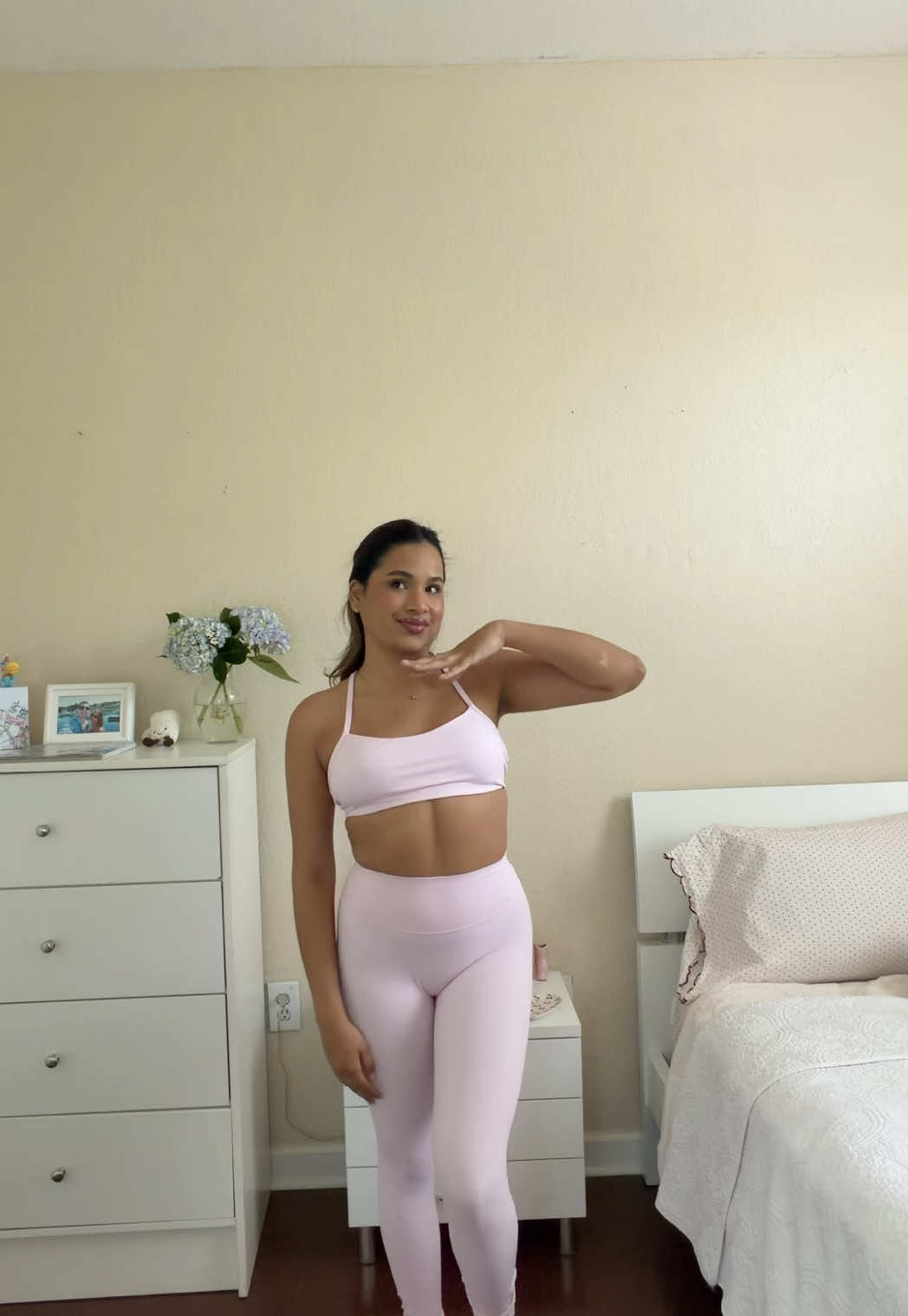 TikTok post by @acoli23 for PAVOI Active. Caption reads: the cutest pink workout set 💗🌸🌷🩷 @Pavoi Active....