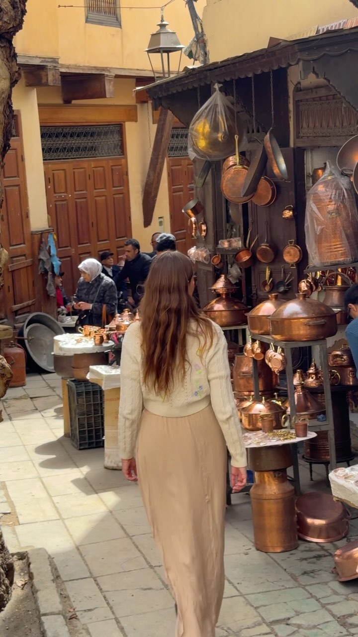 Instagram post by @shetravelledtheworld for Visit Morocco. Caption reads: AD | Explore Morocco’s Fez with me. A city....