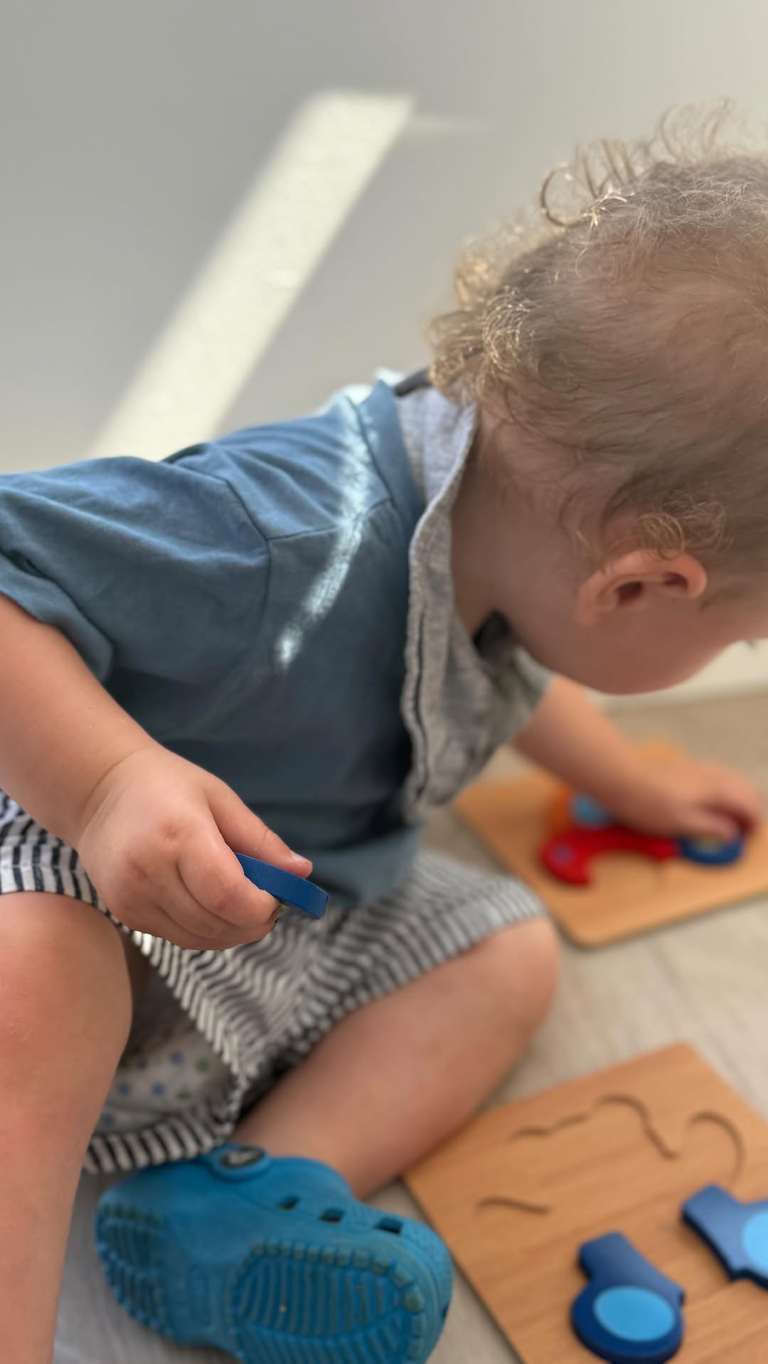 Instagram post by @lifeandhomewithnic_ for Montessori Generation. Caption reads: Colourful and engaging wooden puzzles from....