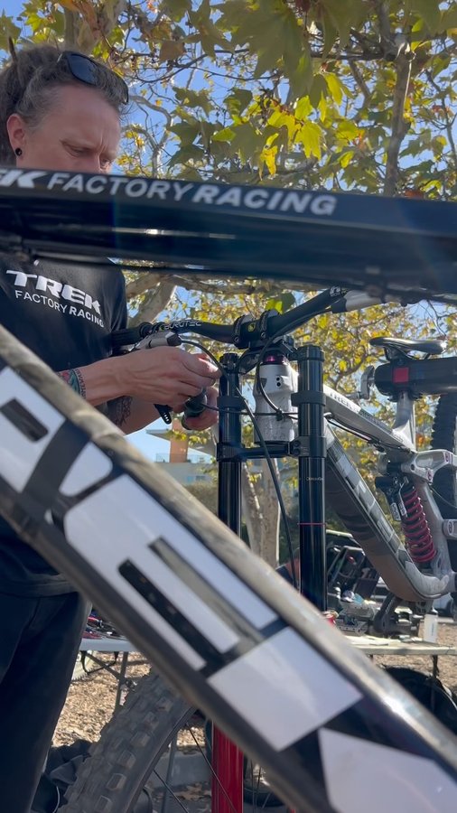 Instagram post by @trekfactoryracingdh for WD-40. Caption reads: [...] pit bits from @trekfactoryracingdh....