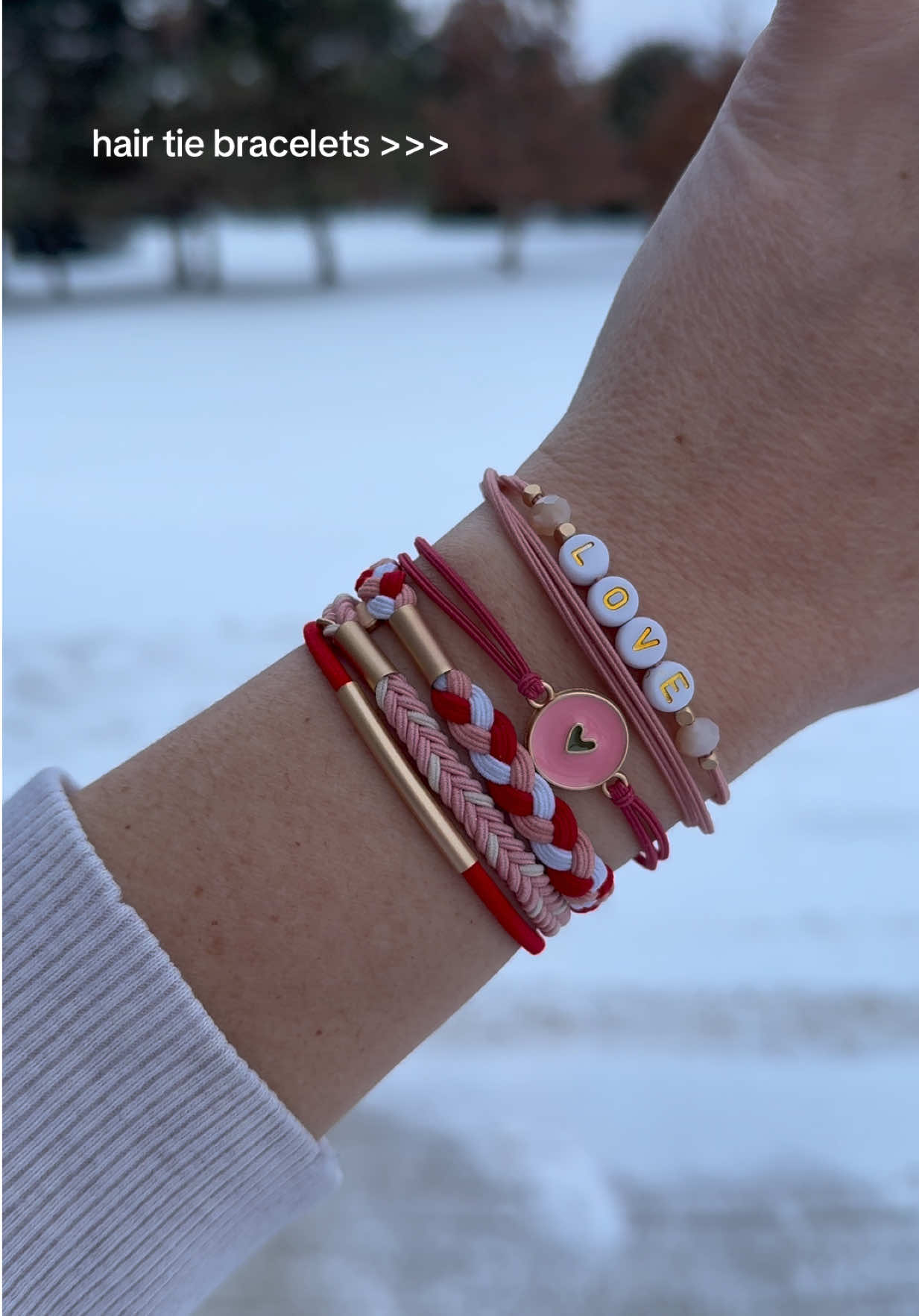 TikTok post by @hal.klotz for K’Lani. Caption reads: Hair ties that don’t ruin your outfit! @K'lani....