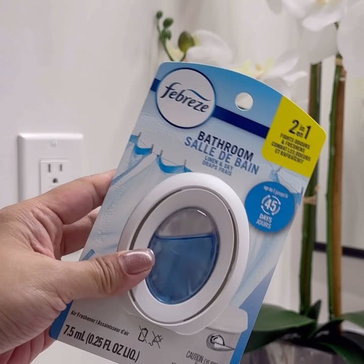 Instagram post by @heartsandkrafts for Febreze. Caption reads: 🚽✨ Refreshed the kids bathroom into a little....