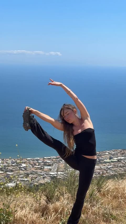 Instagram post by @alliemichellel for Alo Yoga. Caption reads: I met this woman. She hikes five miles every day....