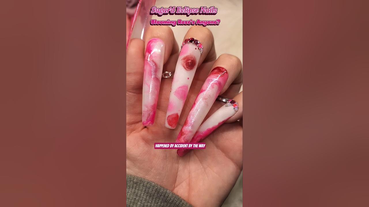 YouTube post by @SUGARDECLIPSENails for Madam Glam. Caption reads: [...] GEL ROSES, COMMENT TUTORIAL!....