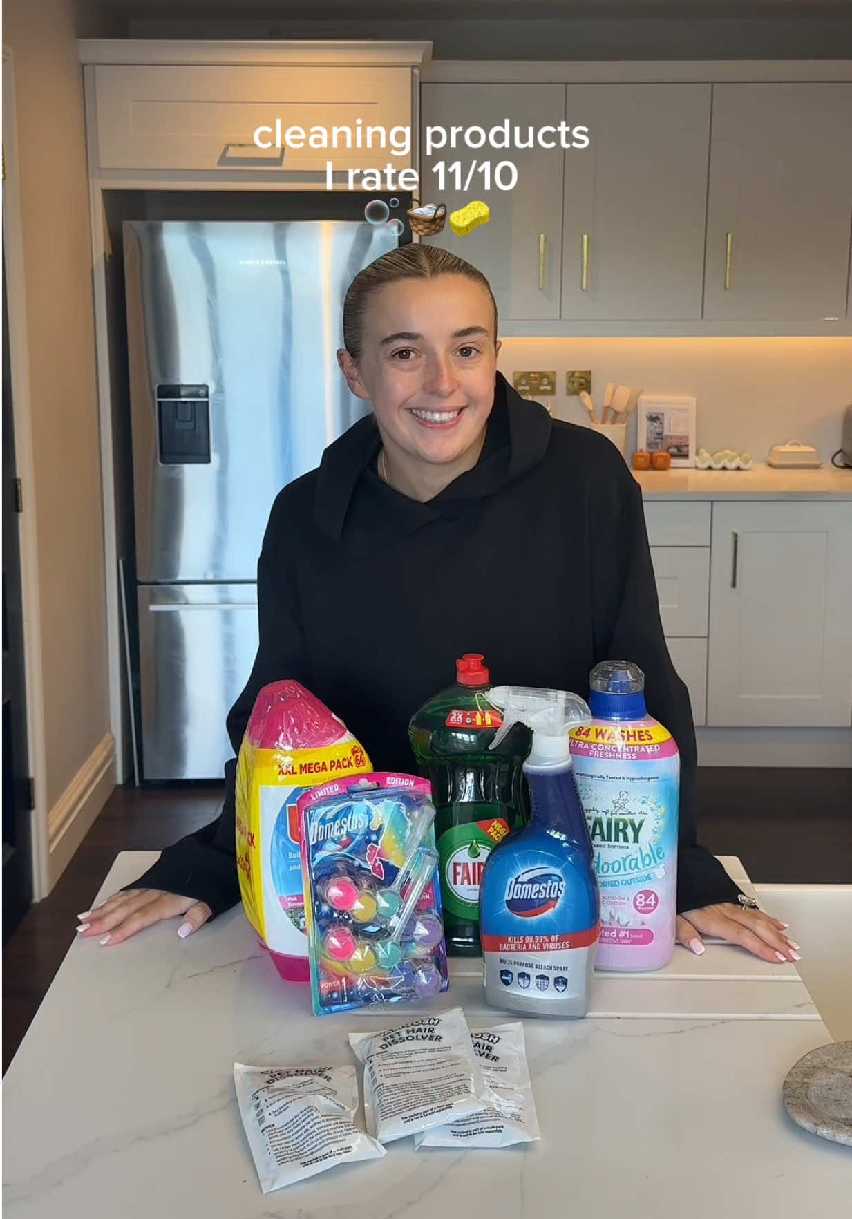 TikTok post by @tabbybellhome for Domestos. Caption reads: Cleaning products I rate 11/10 coming from a....