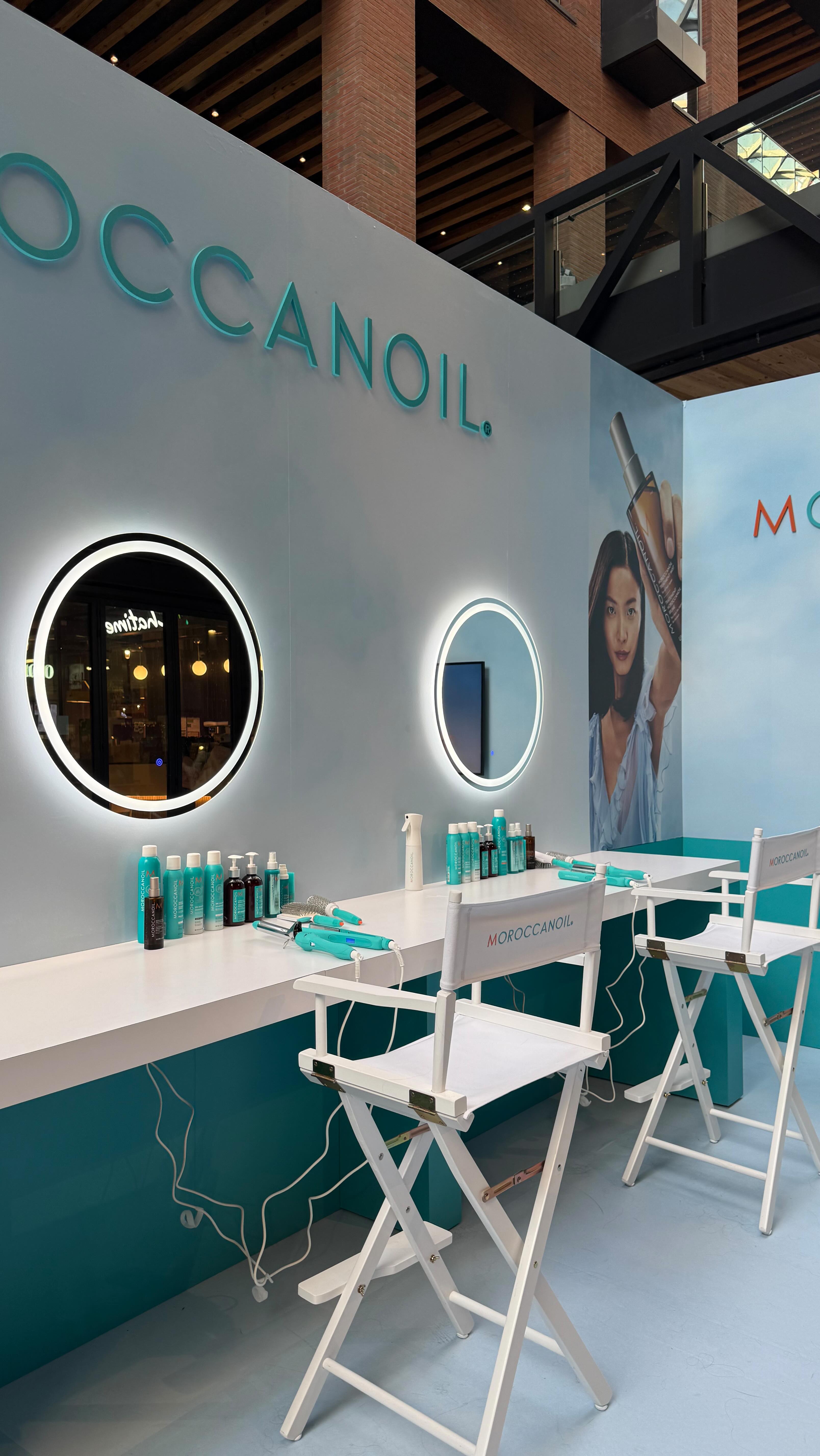 Instagram post by @natdoumkos for Moroccanoil. Caption reads: @moroccanoil is taking over @thewell_to this week....