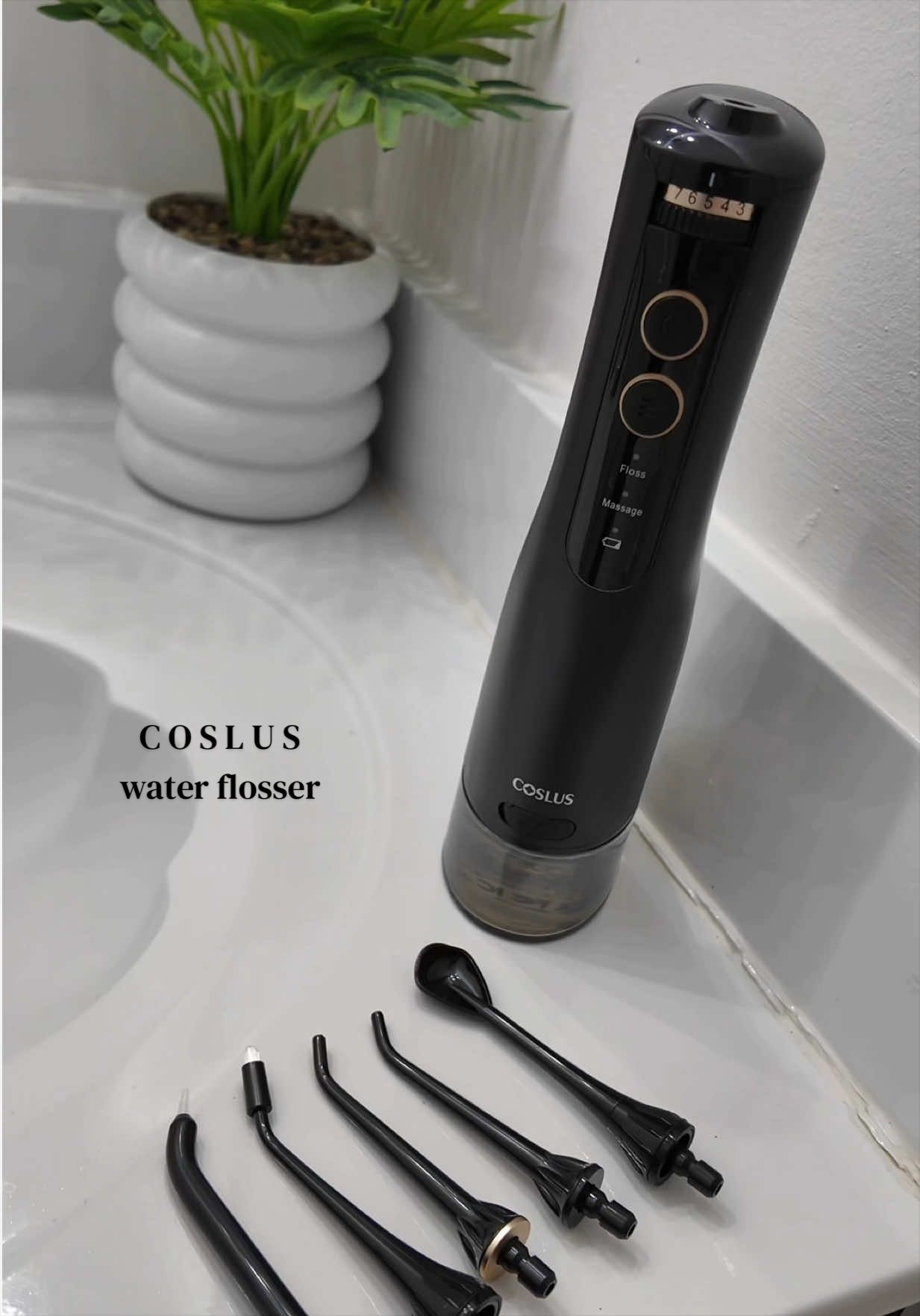 TikTok post by @keepingupwithqueenx3_ for Coslus. Caption reads: Upgrade your dental hygiene with Coslus E40 😁They....