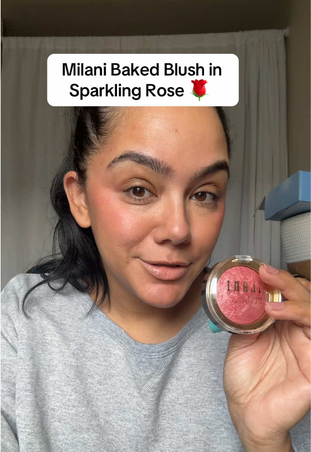 TikTok post by @thenotarichgirl for Milani Cosmetics. Caption reads: [...] Blush in Sparkling Rose @Milani Cosmetics....