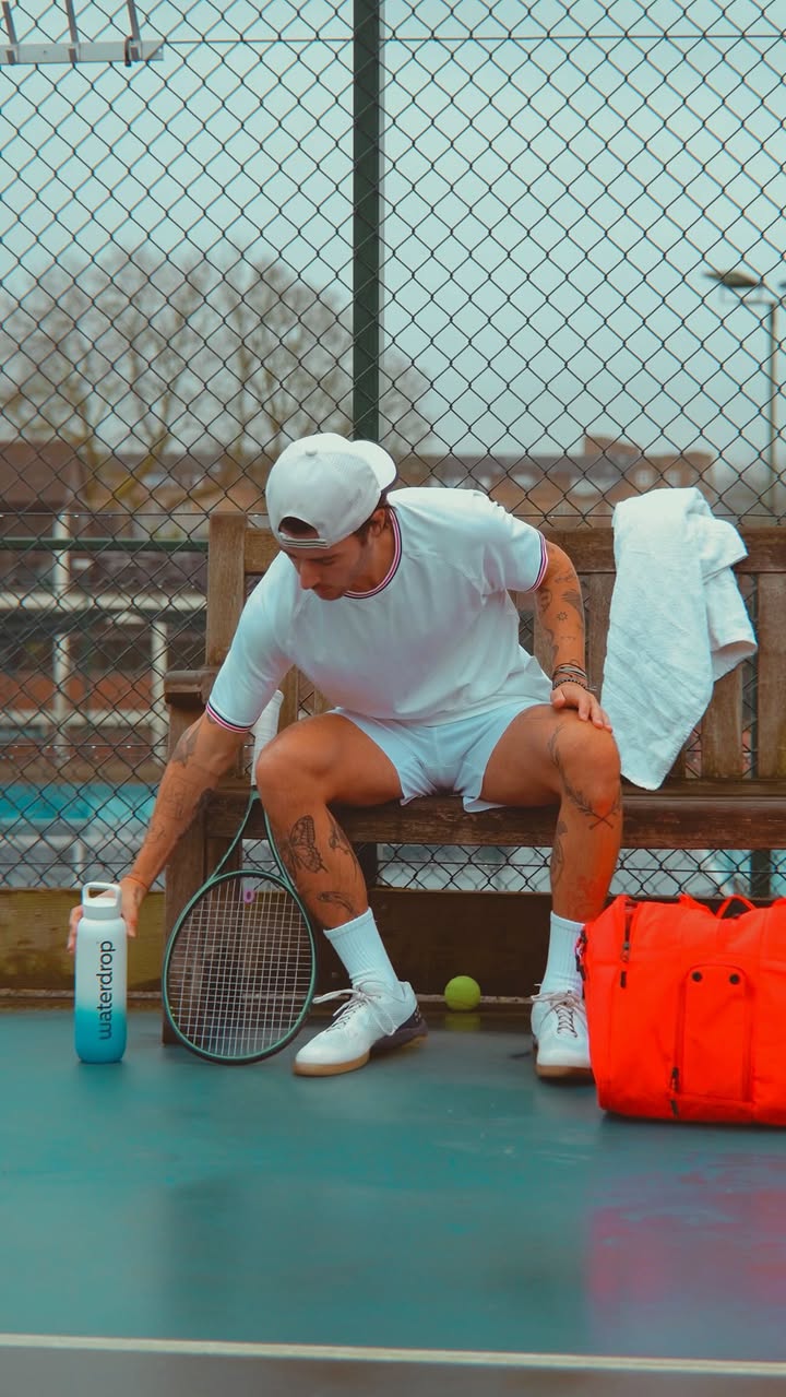 Instagram post by @thetennis101 for Waterdrop. Caption reads: The coolest tennis bottle ✌️ 

The official player....