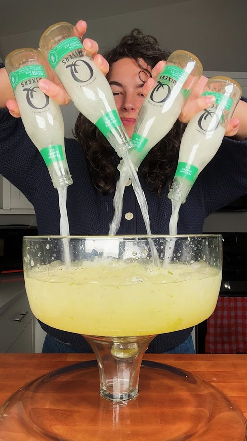 Instagram post by @carolinagelen for Q Mixers. Caption reads: GINGER CHERRY LIMEADE WITH Q GINGER ALE #ad....