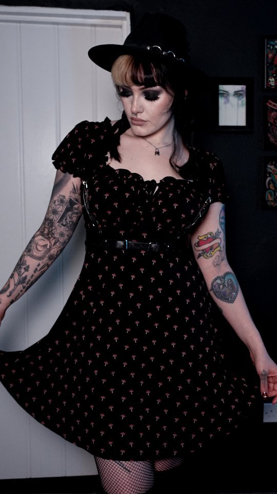 Instagram post by @byhazelj for KATCH ME. Caption reads: [...] (PR) 🖤 @hellflower666 harness 🖤....