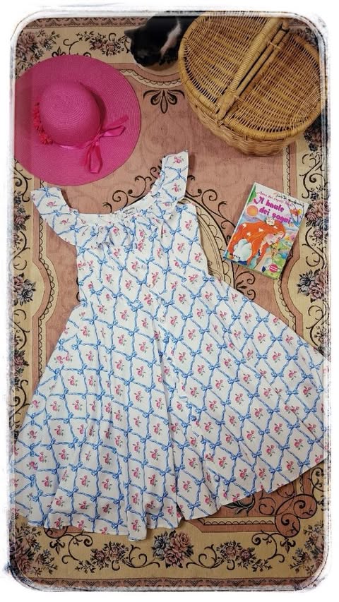 Instagram post by @out_of_time_doll for Unique Vintage. Caption reads: Let's picnic 👒🧺🌼 Dress @uniquevintage, kindly....