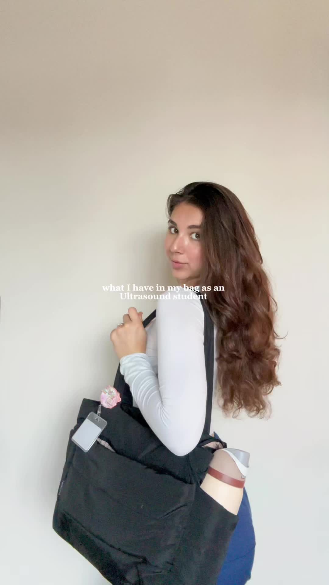 TikTok post by @arianaatoscano for Owala. Caption reads: [...] bag for my 3rd semester!💗🏥 @BAGSMART....