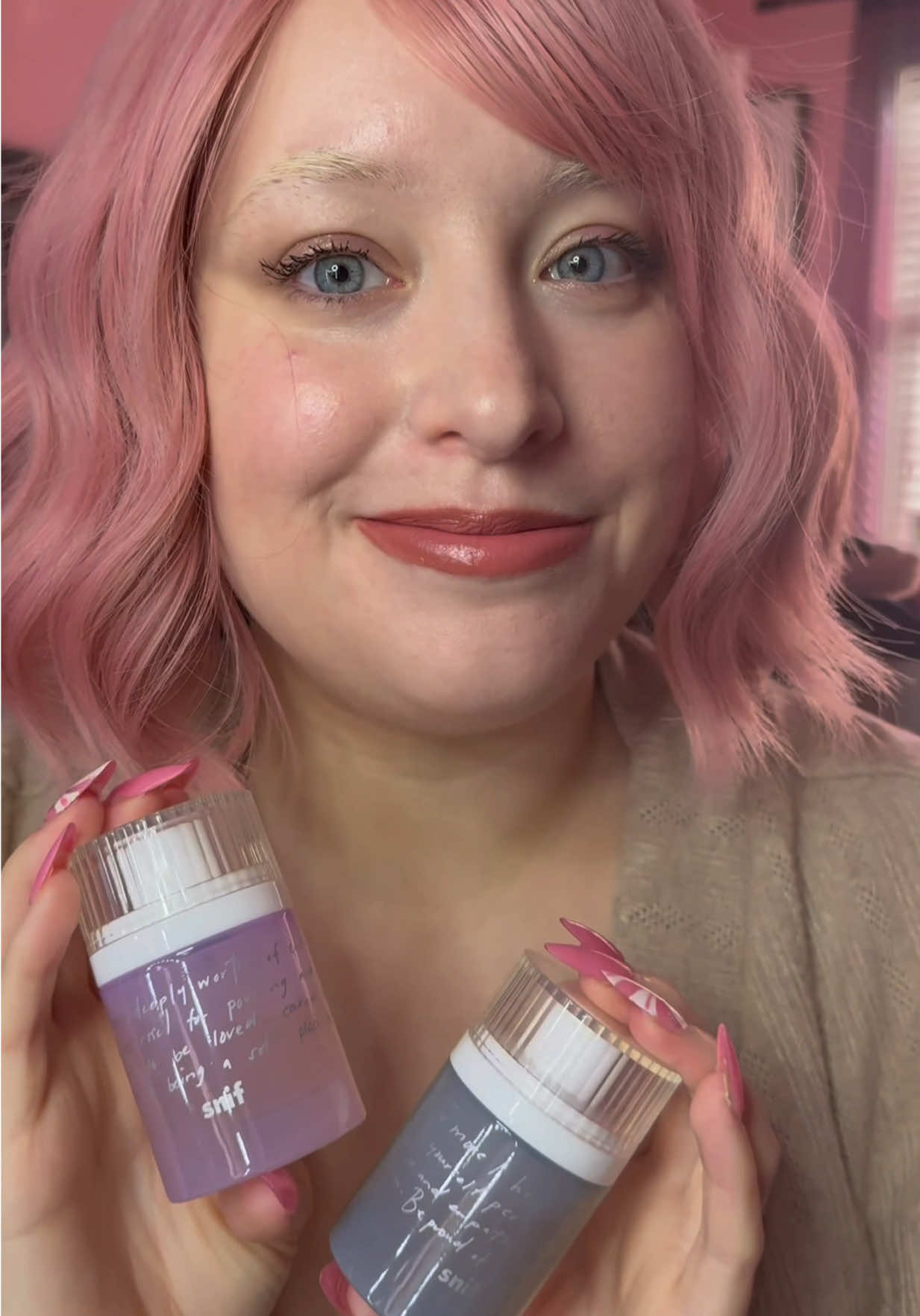 TikTok post by @rainbunperfumery for Snif. Caption reads: 🐇 Reviewing Snif x Alex Elle! So beautiful! @Snif....