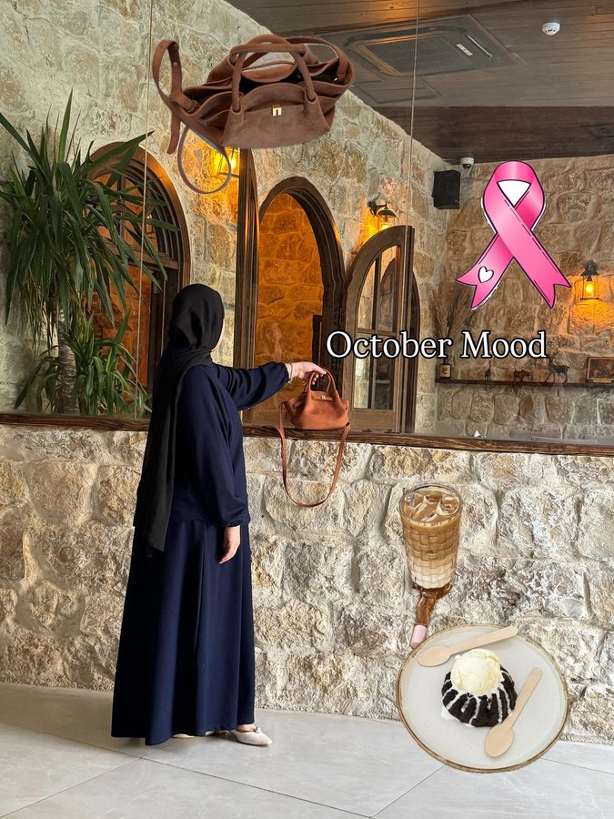 Instagram post by @_zahora.ni for JW PEI. Caption reads: October Mood🤎.