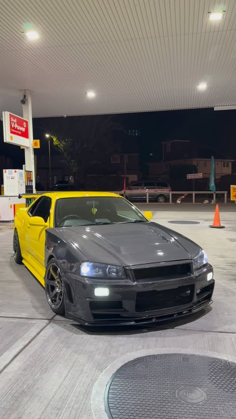 Instagram post by @r34.c1ub for Auto Finesse. Caption reads: james bond : japan 📸: #autofinesse #TeamAF....
