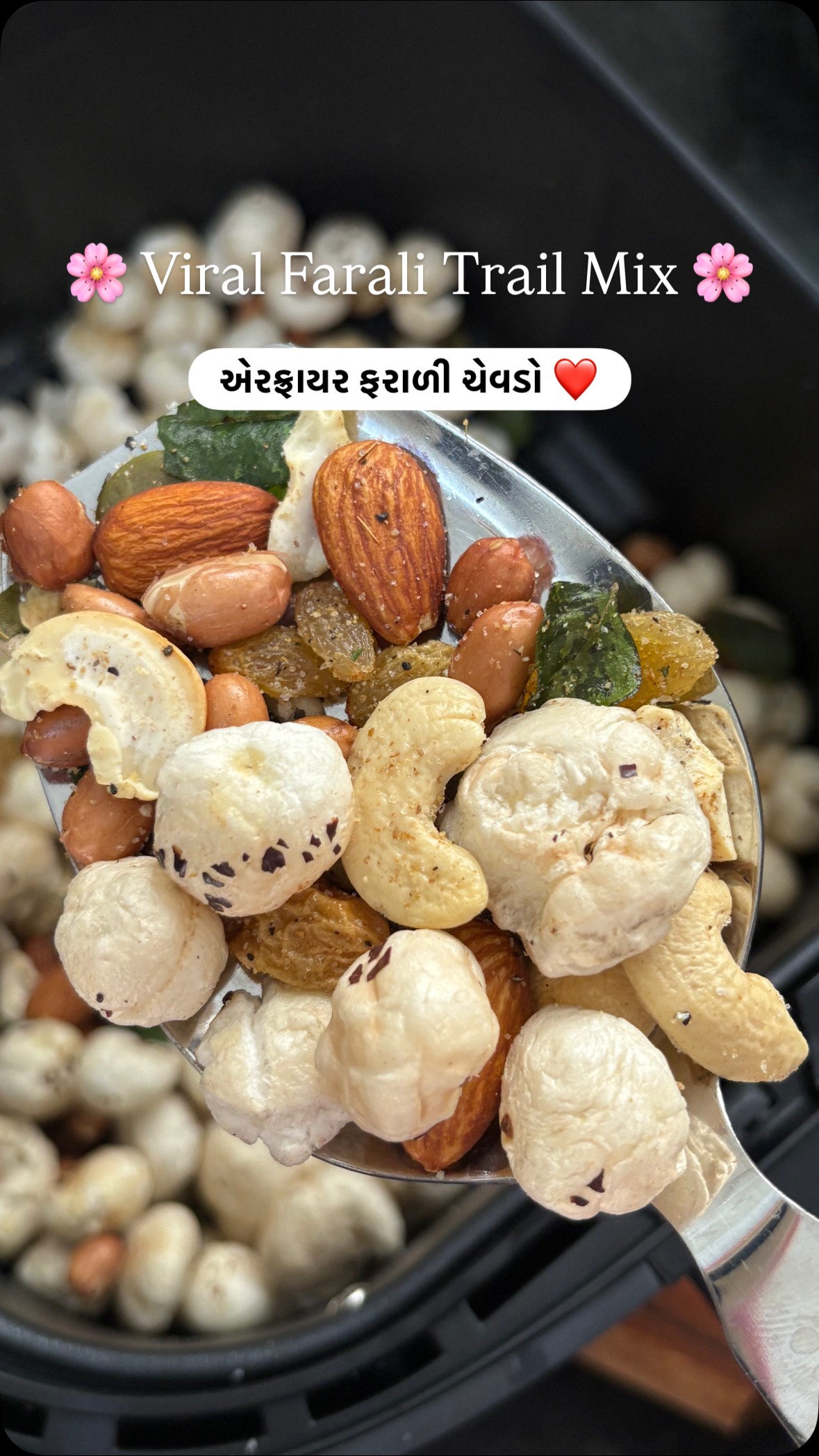 Instagram post by @cook_with_dhruvi for COSORI. Caption reads: Viral Airfryer Trail-Mix😍❤️
.
Healthy cooking....