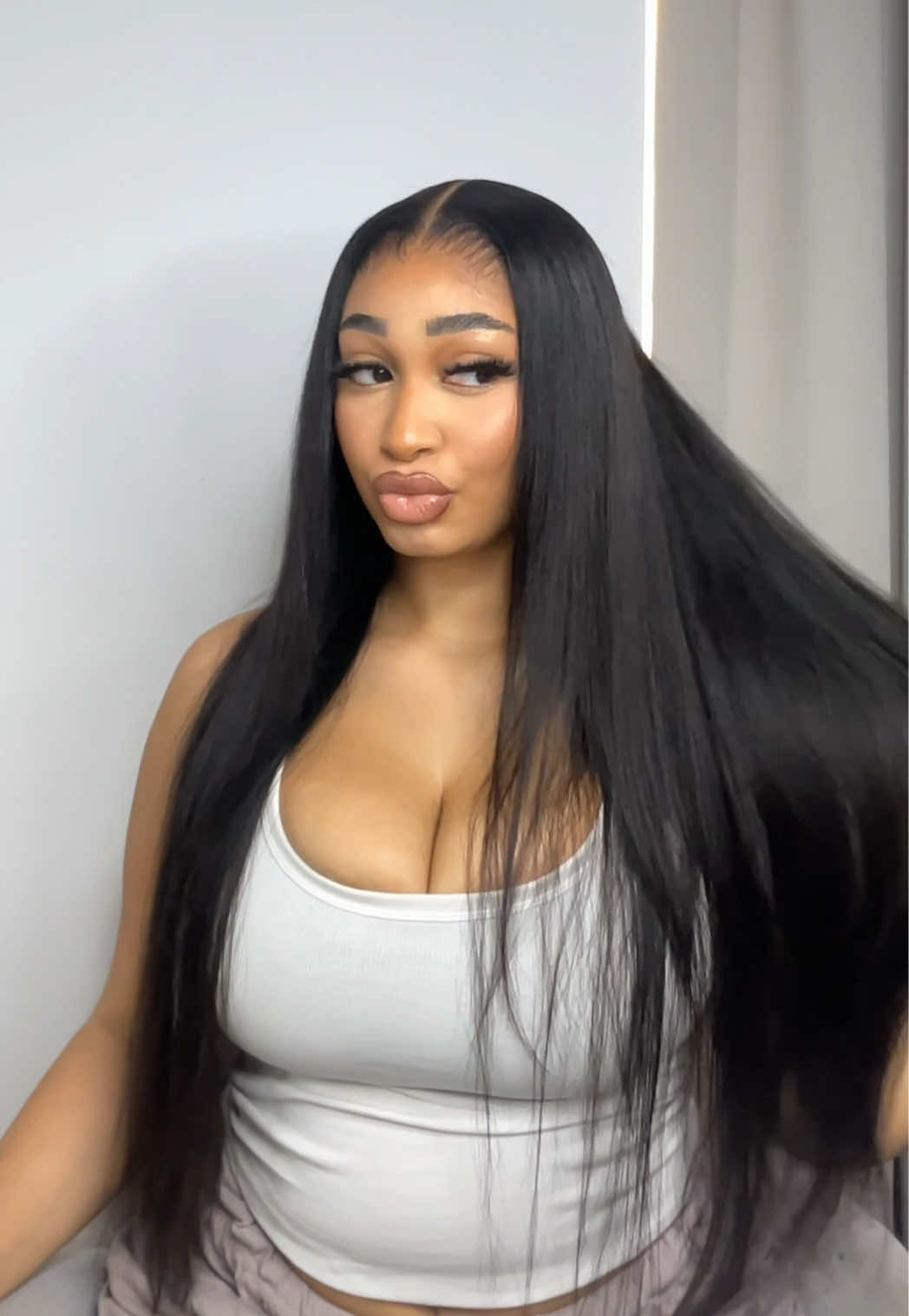 TikTok post by @georgiaokun for Sterly Hair. Caption reads: [...] every time🖤 Code TT30 for 30% off!....