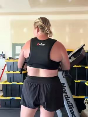 TikTok post by @mandawoodhead for Zelus Fitness. Caption reads: @ZELUS Fitness 15 lb weighted vest has officially....