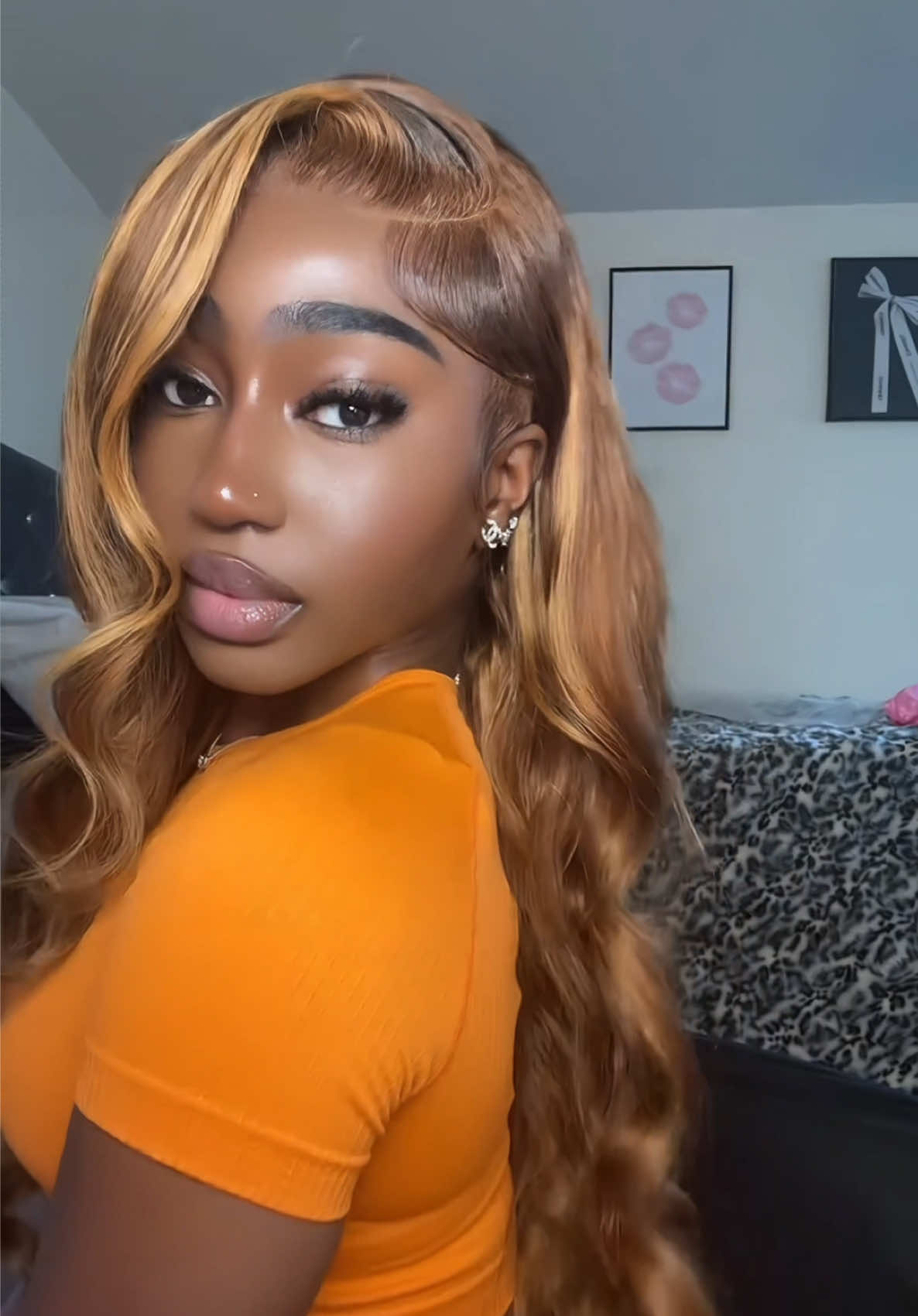 TikTok post by @msbehavee for Pizazz Hair. Caption reads: [...] gorgeous honey blonde wig is from @Pizazz....