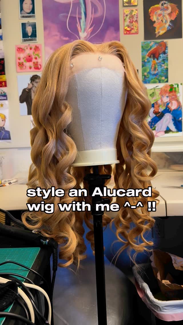 Instagram post by @celestiallfae.studios for dokidokicosplay. Caption reads: style an Alucard wig with me from....