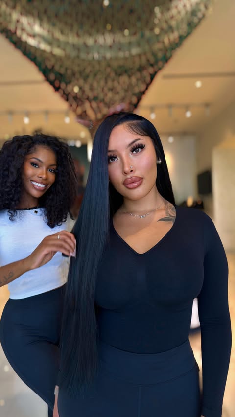 Instagram post by @bysharalaurie for D Hair Boutique. Caption reads: [...] & installed 28’ Malaysian Wavy from....