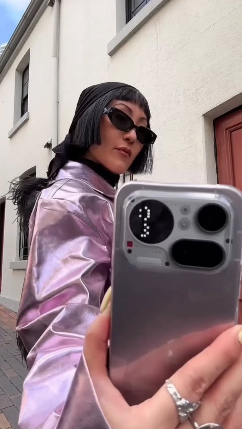 Instagram post by @charlene_ye_davies for Nothing. Caption reads: The reality of fashion week? My @Nothing Phone....