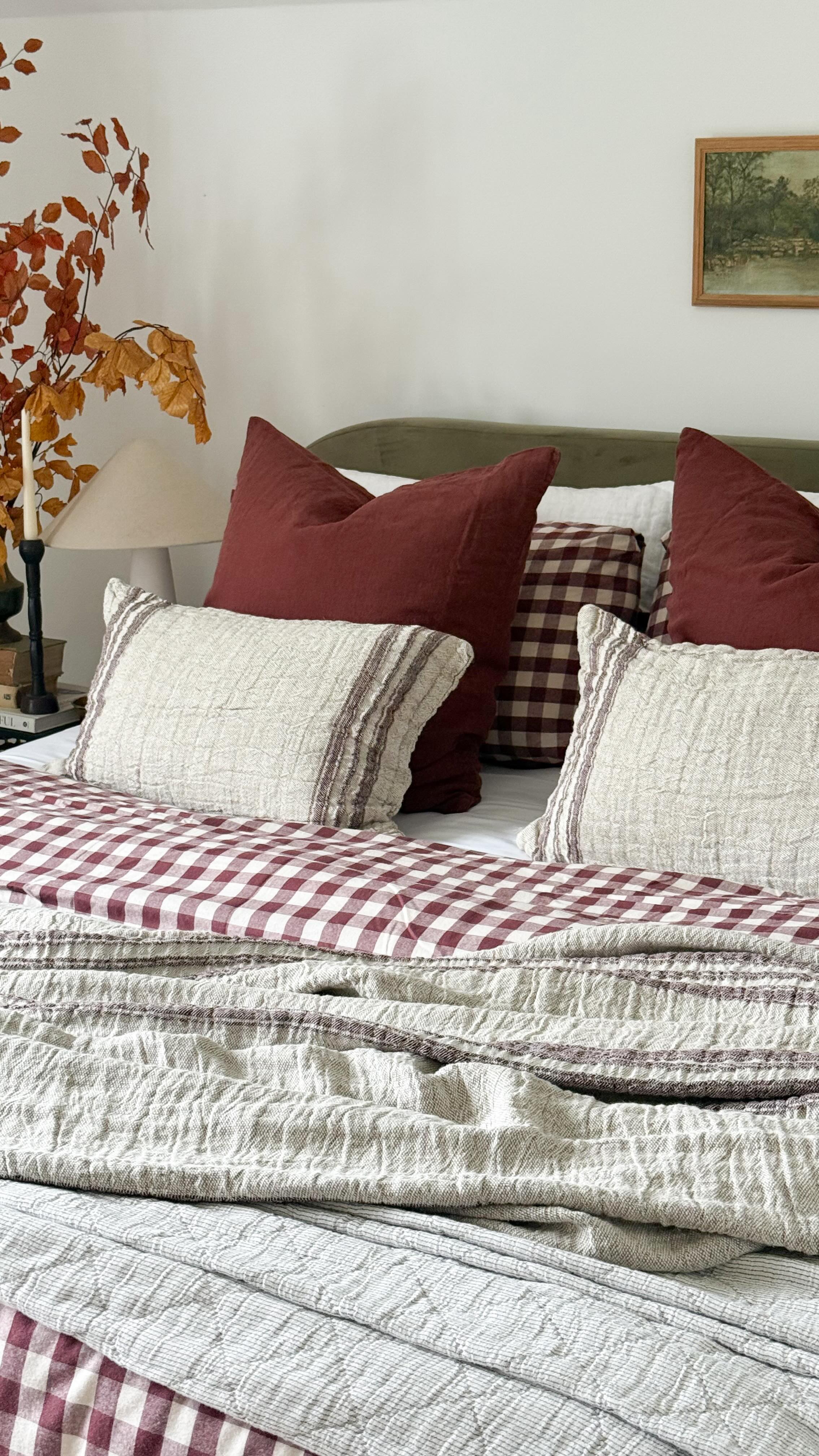 Instagram post by @brionyaceinteriors for Secret Linen Store. Caption reads: [...] super cosy A/W bedroom look with....