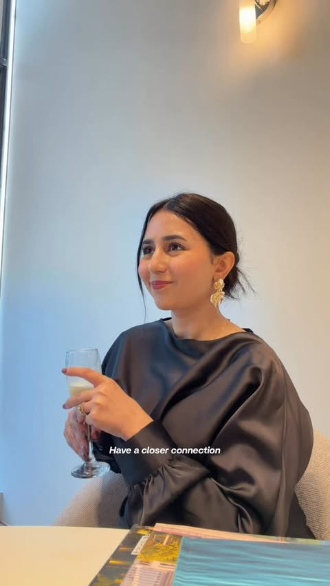 Instagram post by @aqsaaamirb for Danube Properties. Caption reads: [...] 🇬🇧➡️🇦🇪 Attended the launch of Danube....