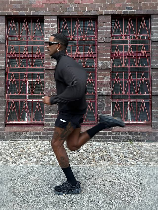 Instagram post by @essi_tesfom for HOKA. Caption reads: [...] the black colorway from the @xlimlink ×....