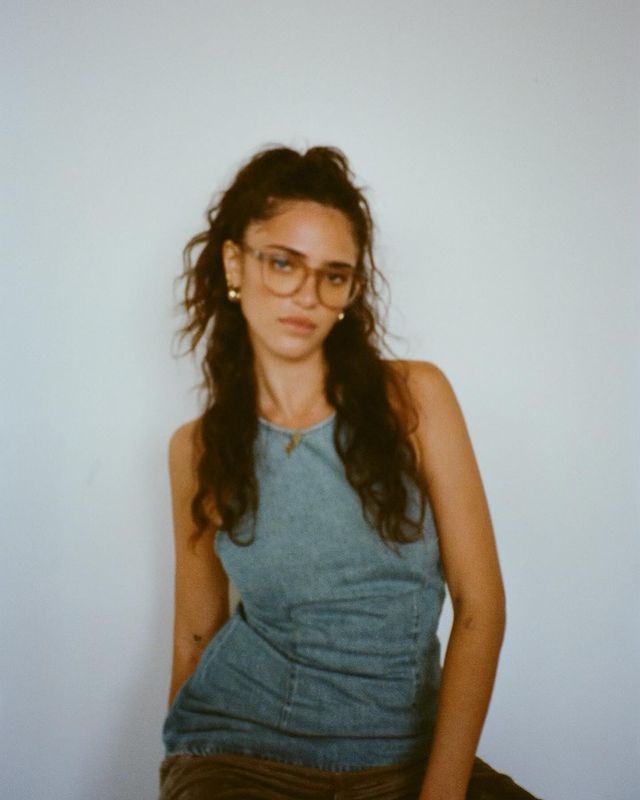 Instagram post by @lunablaise for Warby Parker. Caption reads: rose colored glasses , sunny skies etc🪽🎀☀️👓....